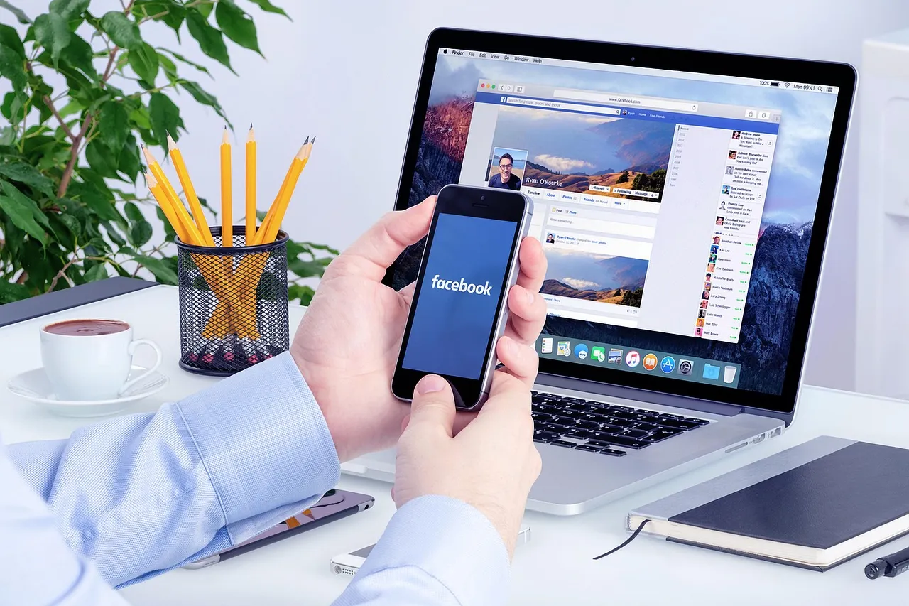 Facebook on a laptop and mobile device